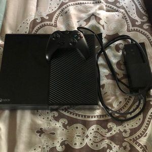 Xbox One with a controller and Madden 19